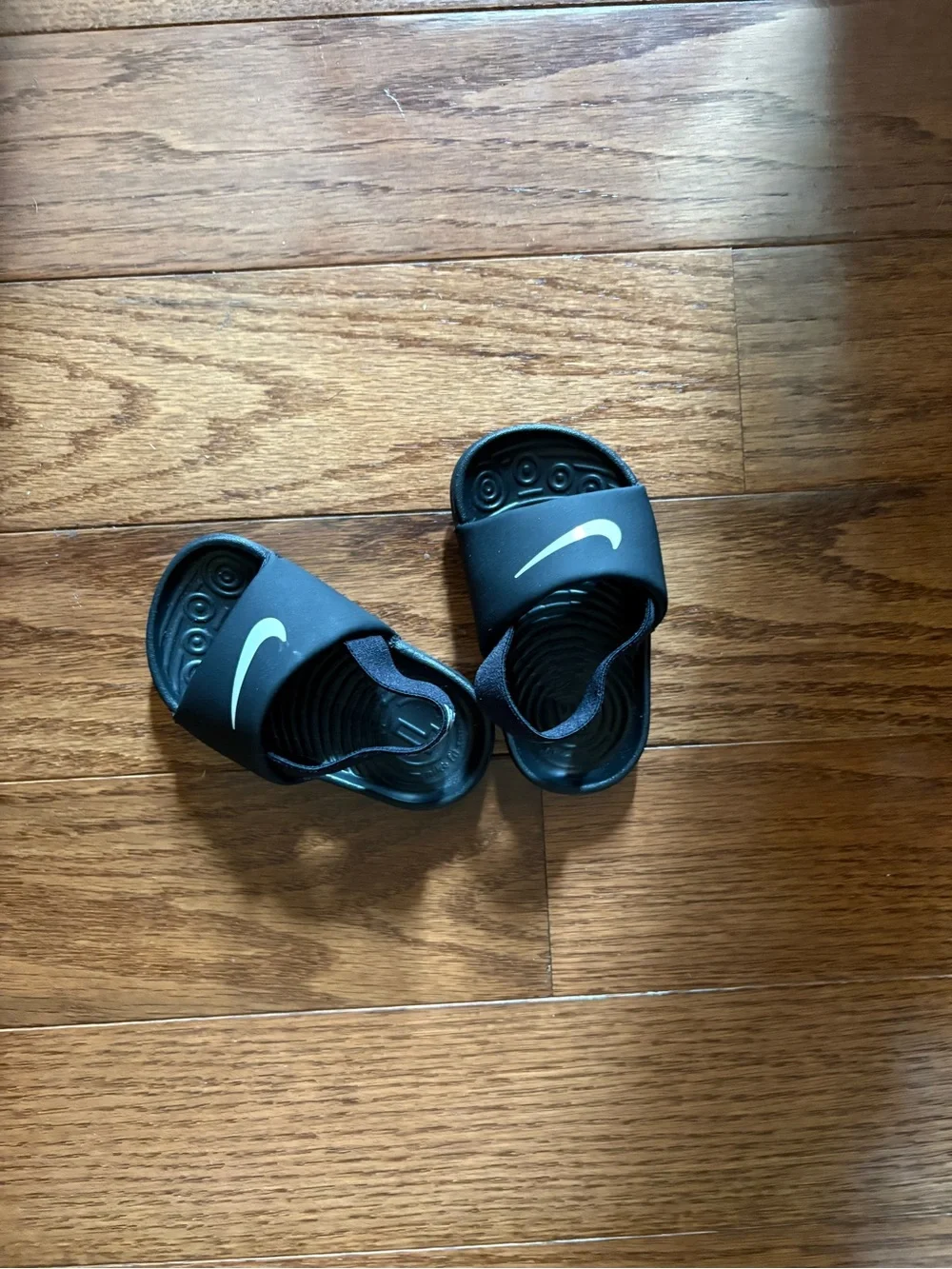 Nike Kids Black Slide Sandals with White Swoosh